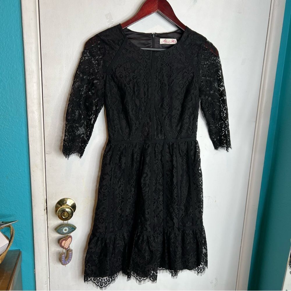 This is an Alannah Hill black lace dress midi Australian